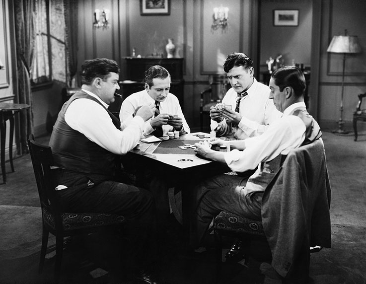 Cuatro hombres jugando a las cartas - historia de la baraja francesa